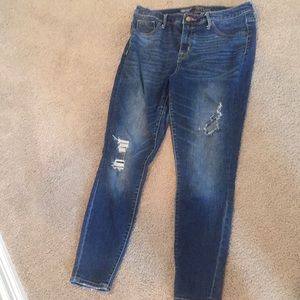 Dark blue ripped jeans